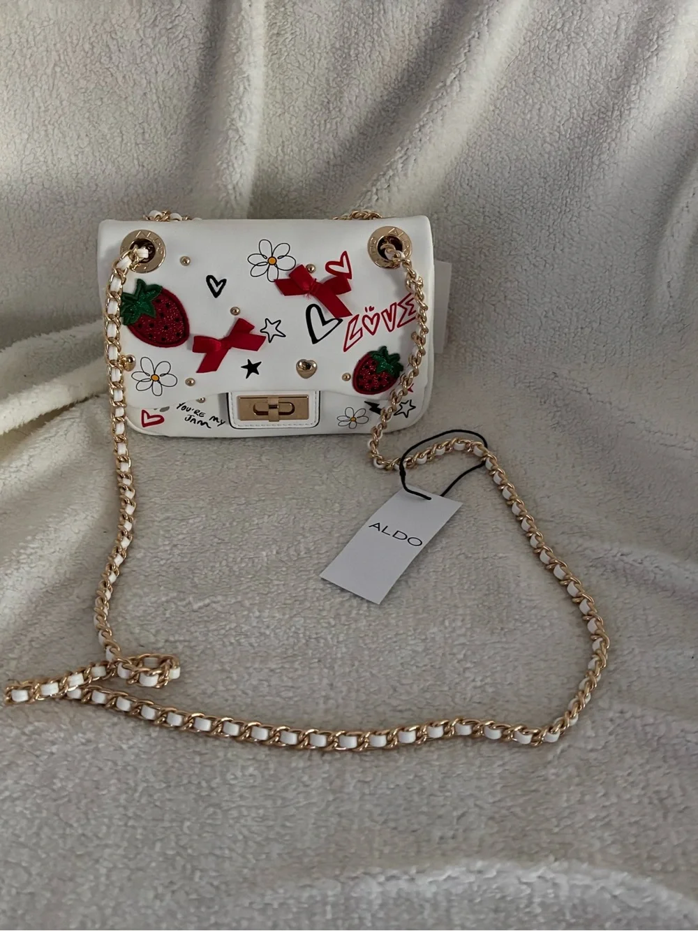 Aldo White Crossbody with Red Strawberry & Bow Accents